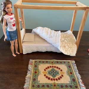 Barbie doll with accessories and bed
